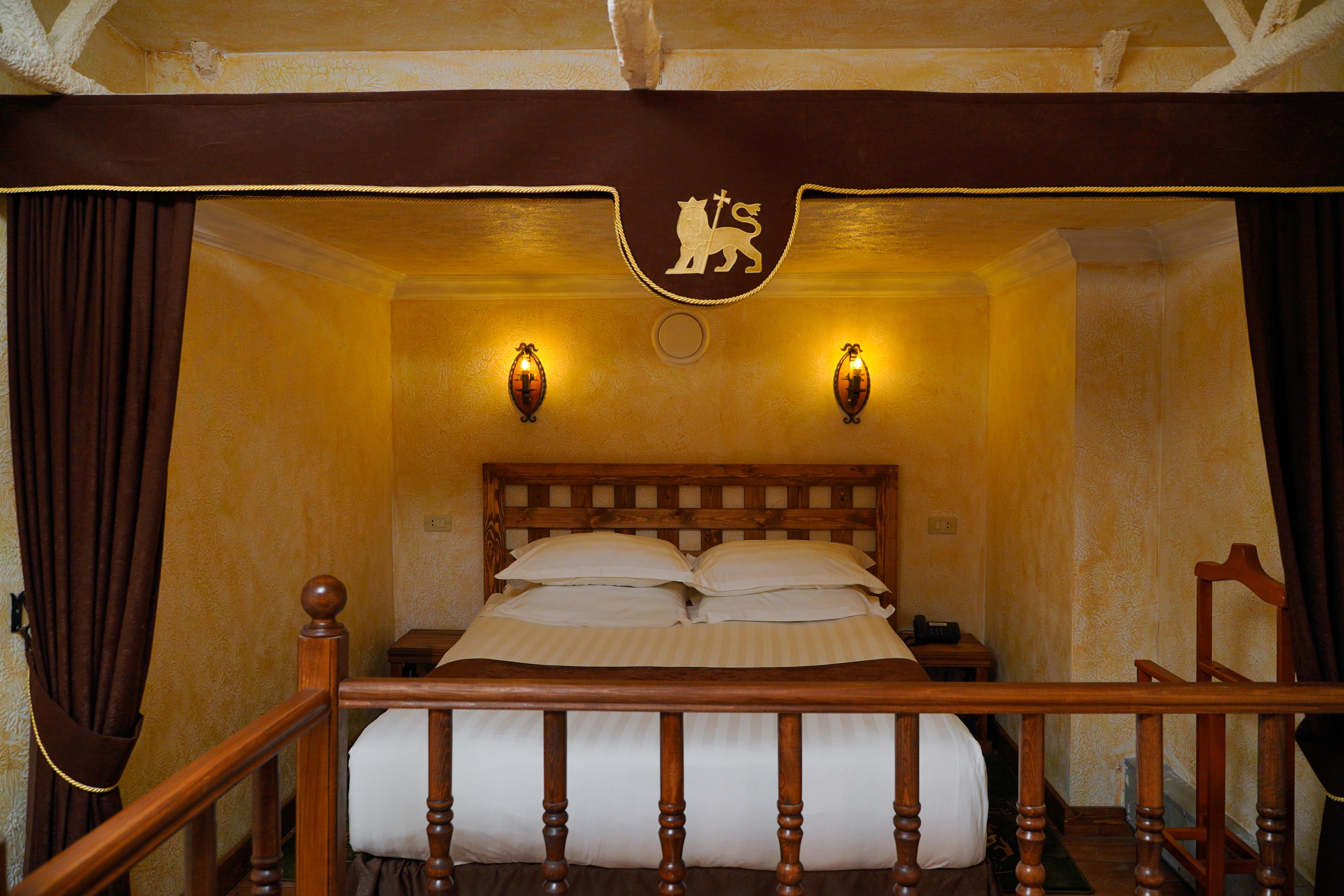 Caucasus Hotel Kasagh ภายนอก รูปภาพ A room at the hotel